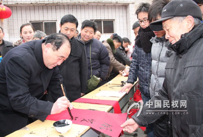 我县举行义写春联活动
