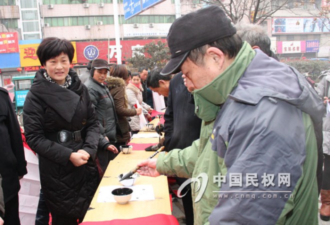 我县举行义写春联活动